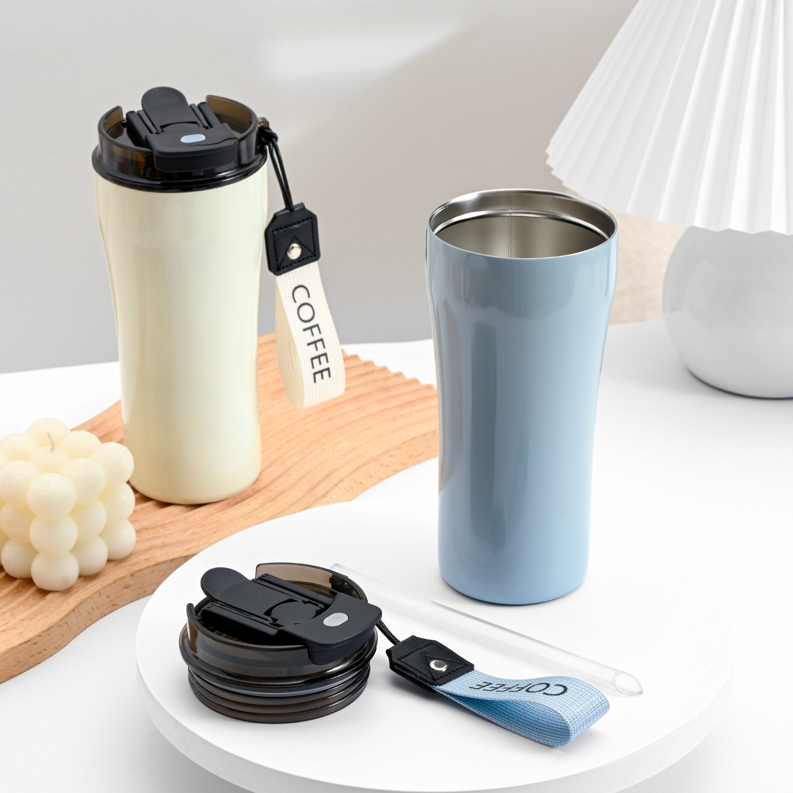 Sunsum China double-wall 304 stainless steel tumbler — 560ml travel mug with flip lid and carry strap